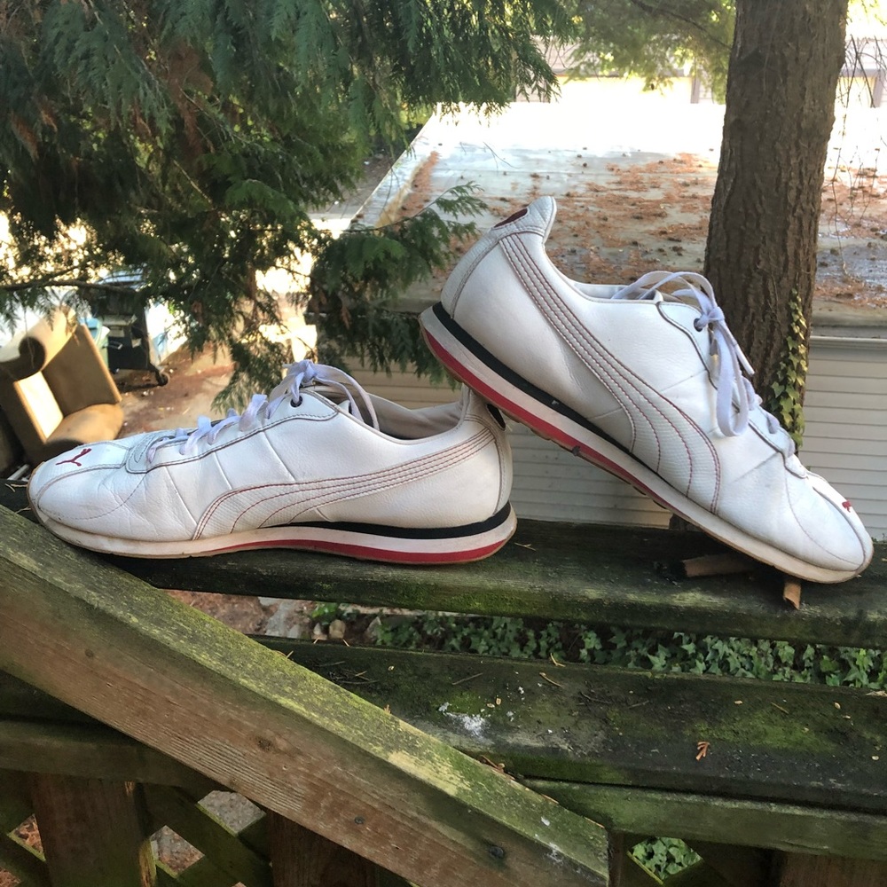 Vintage White Puma Turin with red accents.